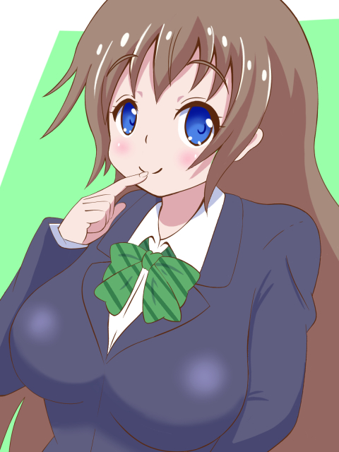 口に指先をあてる女子高生