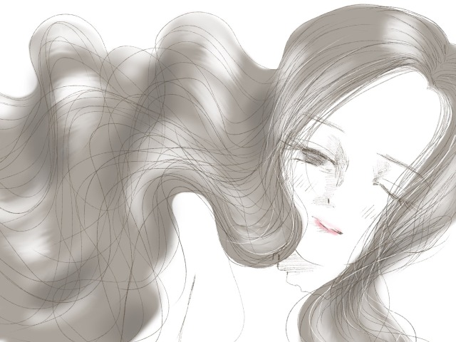 女性の髪が靡く