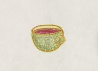 コーヒーの入ったマグカップ