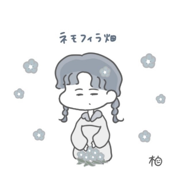 女性とネモフィラ